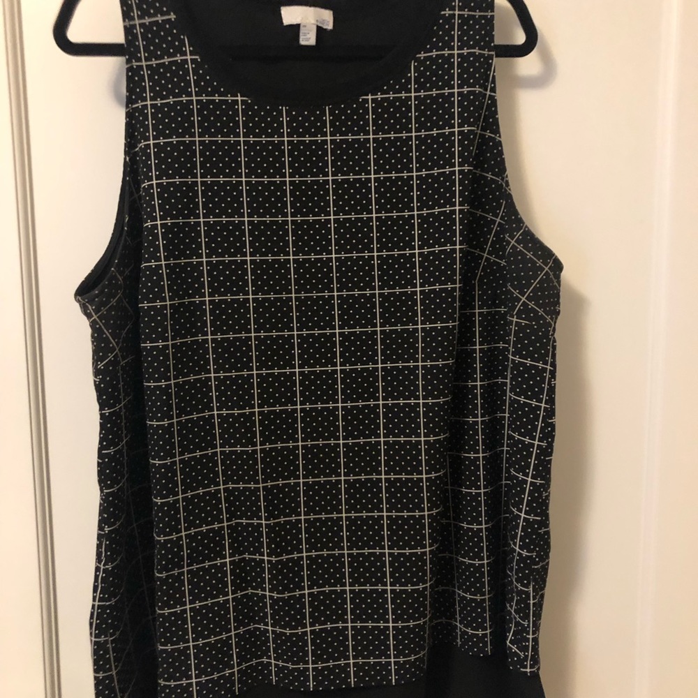 Sleeveless blouse with flyaway back